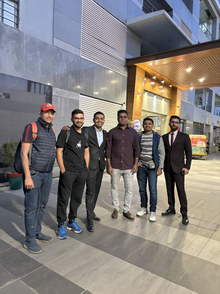 Members of the hospitality team gathered outside their accommodation